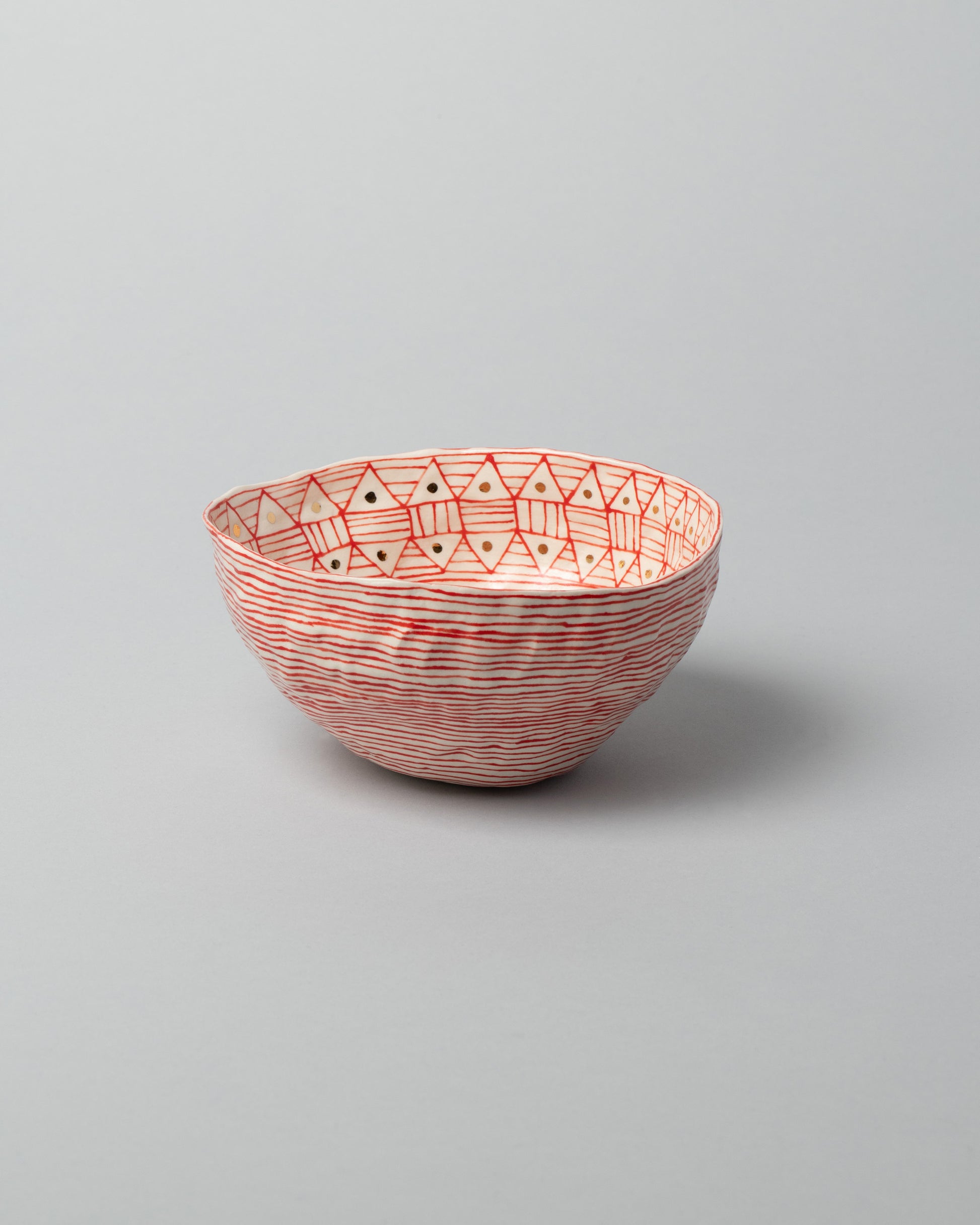 Suzanne Sullivan One Pinch Bowl on light color background.