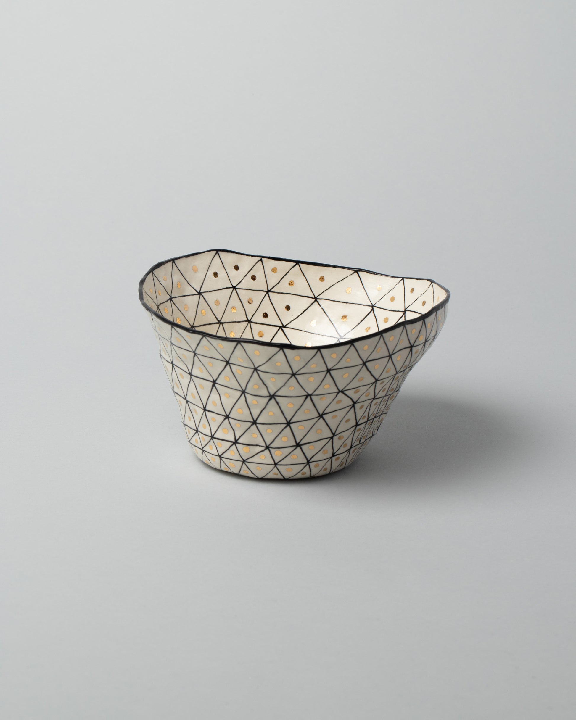 Suzanne Sullivan Two Pinch Bowl on light color background.