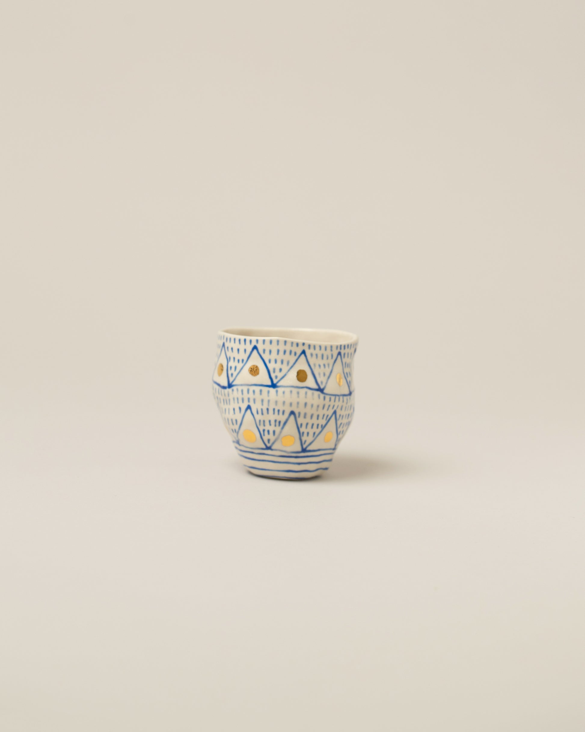 A Suzanne Sullivan Tumbler on light color background, representing the 'Surprise Me' style which will be hand selected by our stylist, rather than representing exactly any single Tumbler.