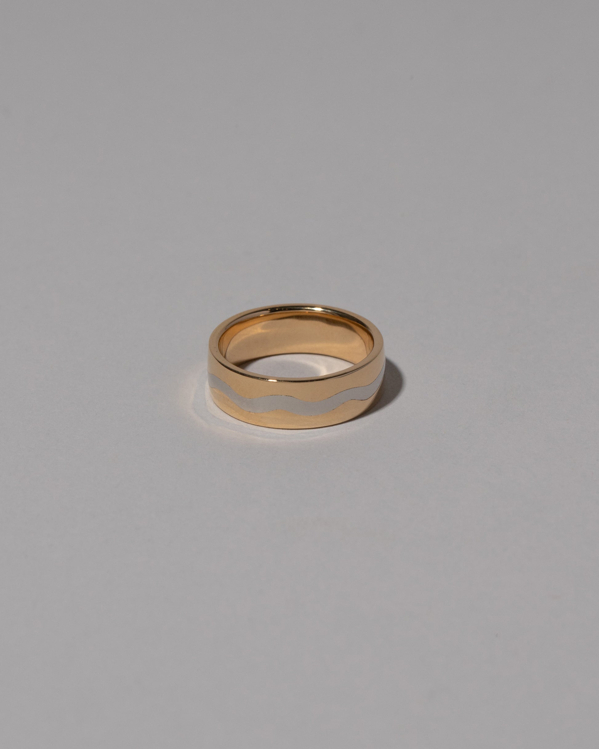 6mm Gold & Platinum Inlaid Band on light color background.