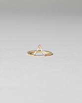 Gold Baguette Triangle Band on light color background.