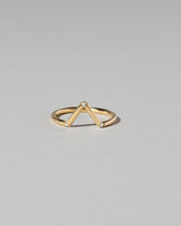 Gold White Diamond Three Stone Triangle Band on light color background.