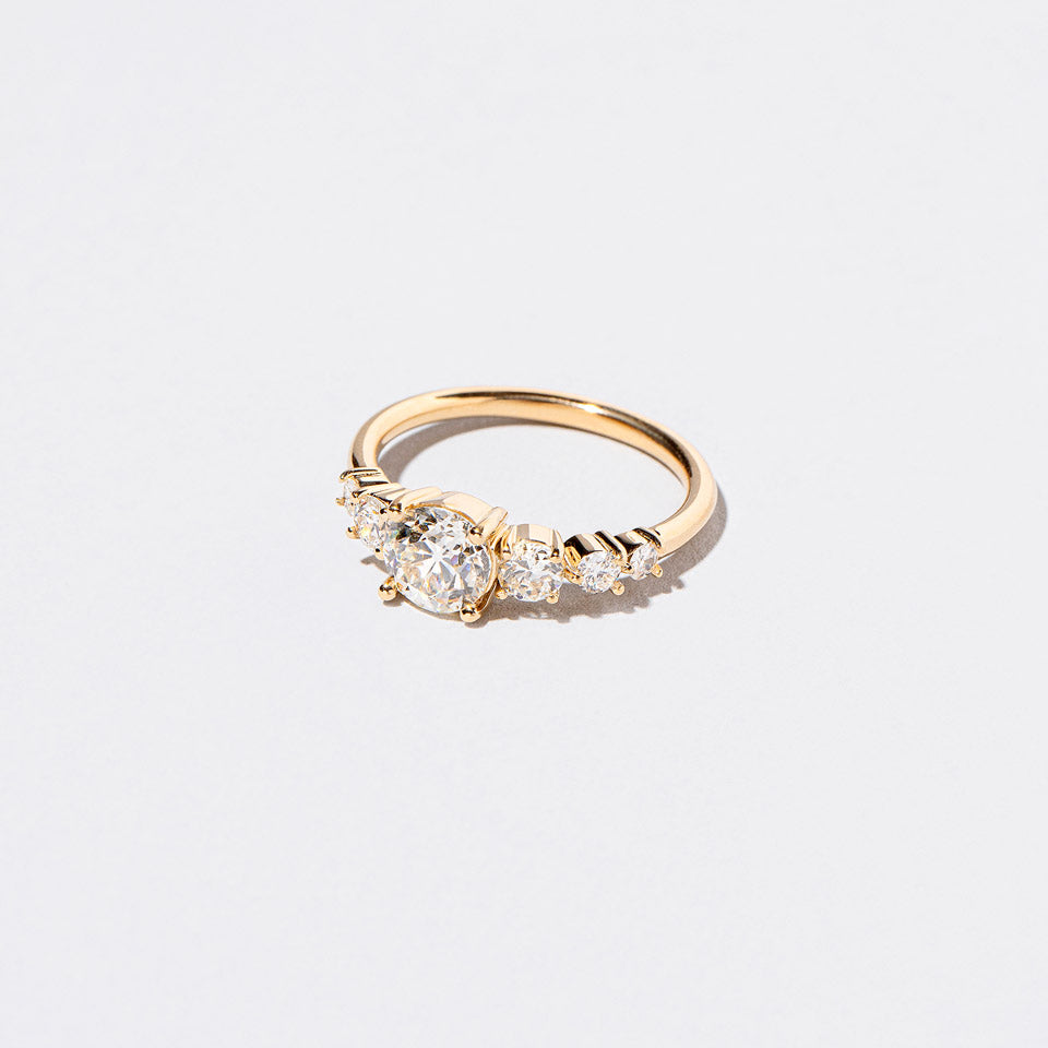 product_details::Capella Ring - White Diamond on light color background.