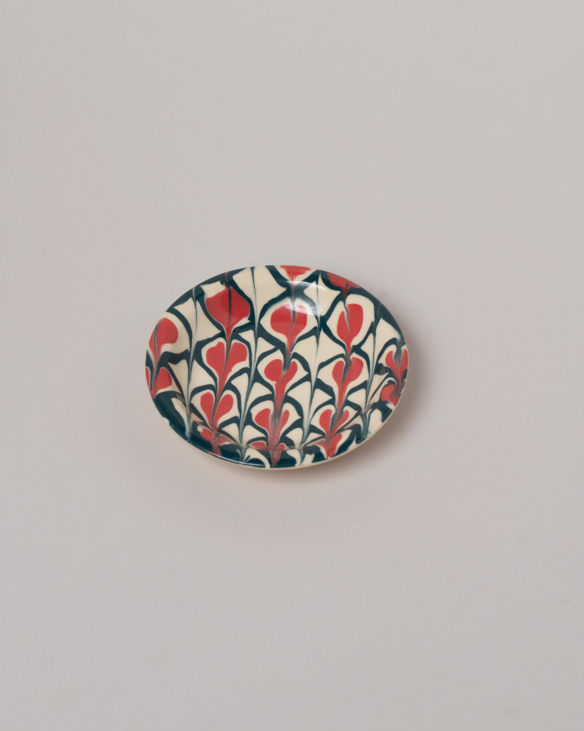 Morgan Levine Spade Mini Trinket Dish on light color background.