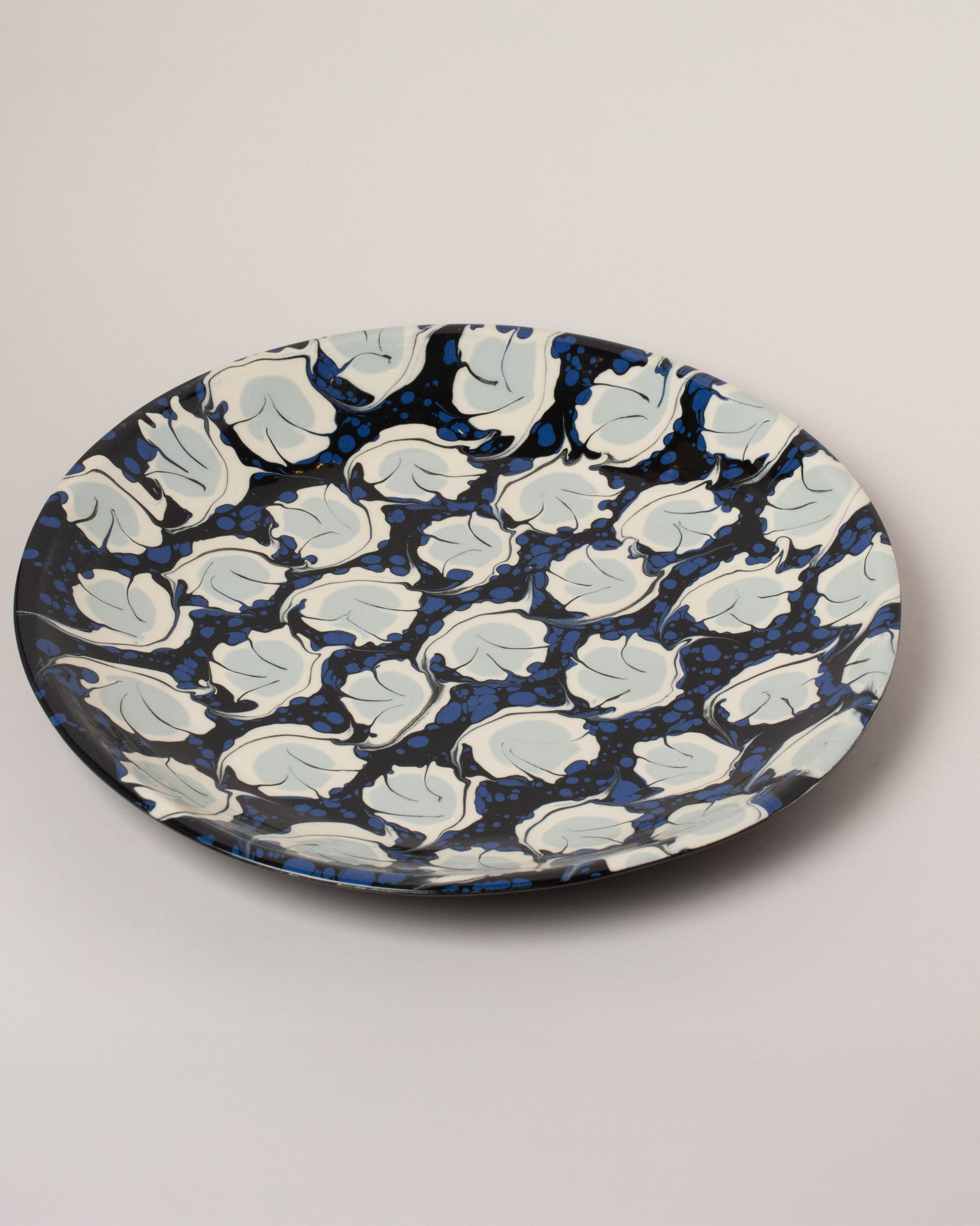 Morgan Levine Midnight Platter on light color background.