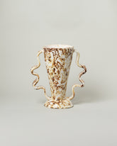 Morgan Peck Stone Brown and White Stretch Vase on light color background.