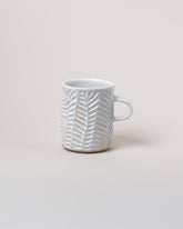 Beth Katz/Mt Washington Pottery Magnetic Lineation Mug on light color background.