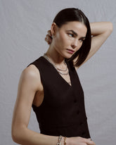 Styled image featuring CRZM jewelry on model.