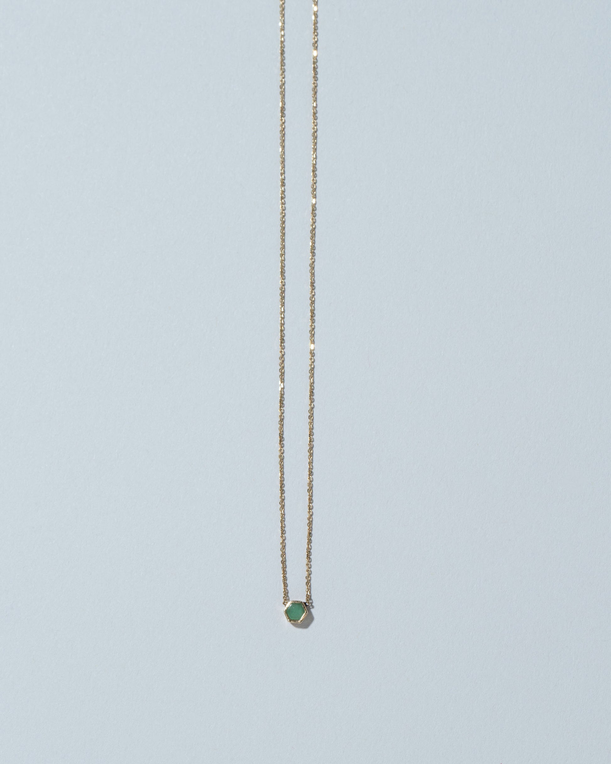 Variscite Hexagon Necklace on light color background.