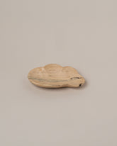 Namu Home Goods One Cloud Plate on light color background.