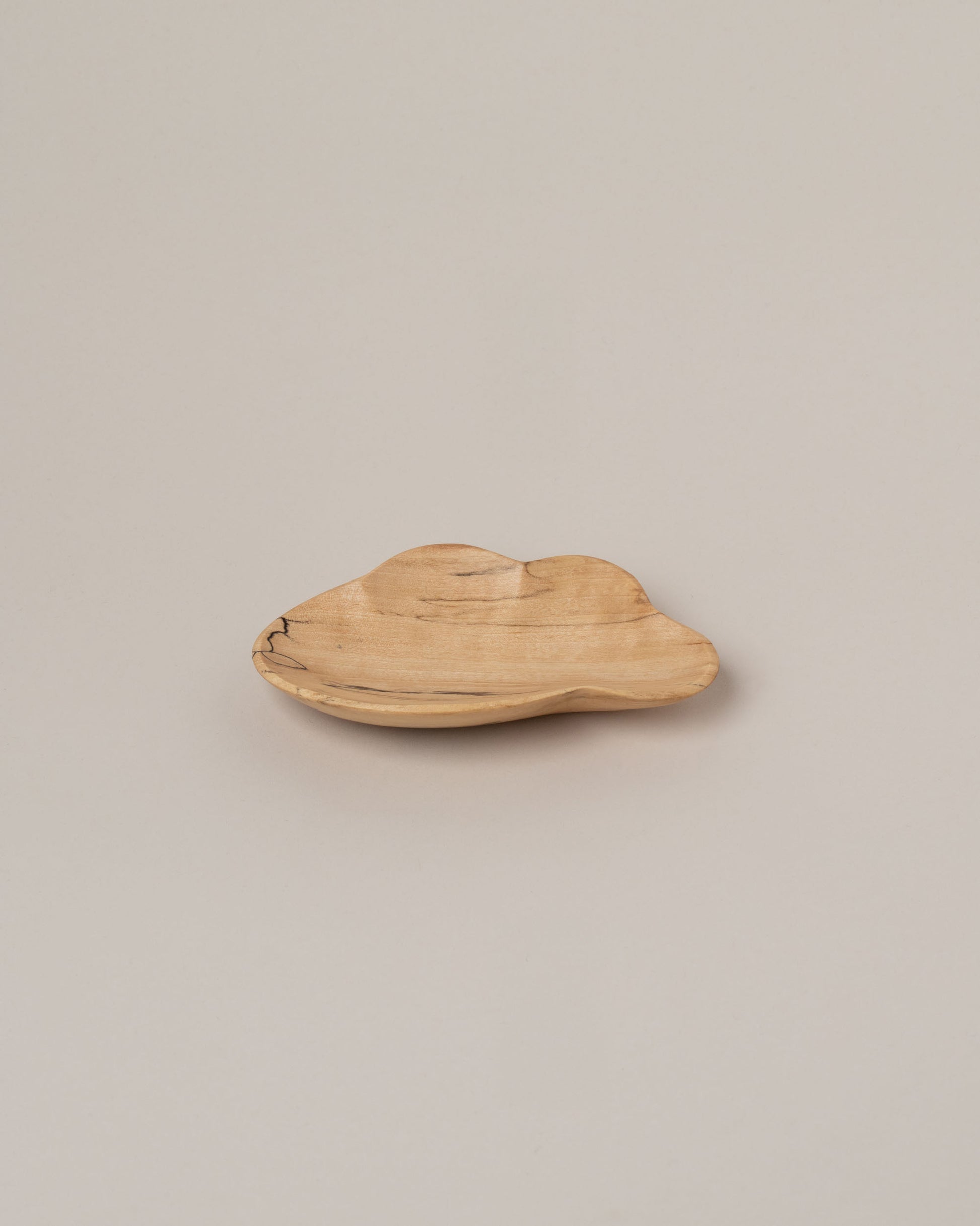 Namu Home Goods Four Cloud Plate on light color background.