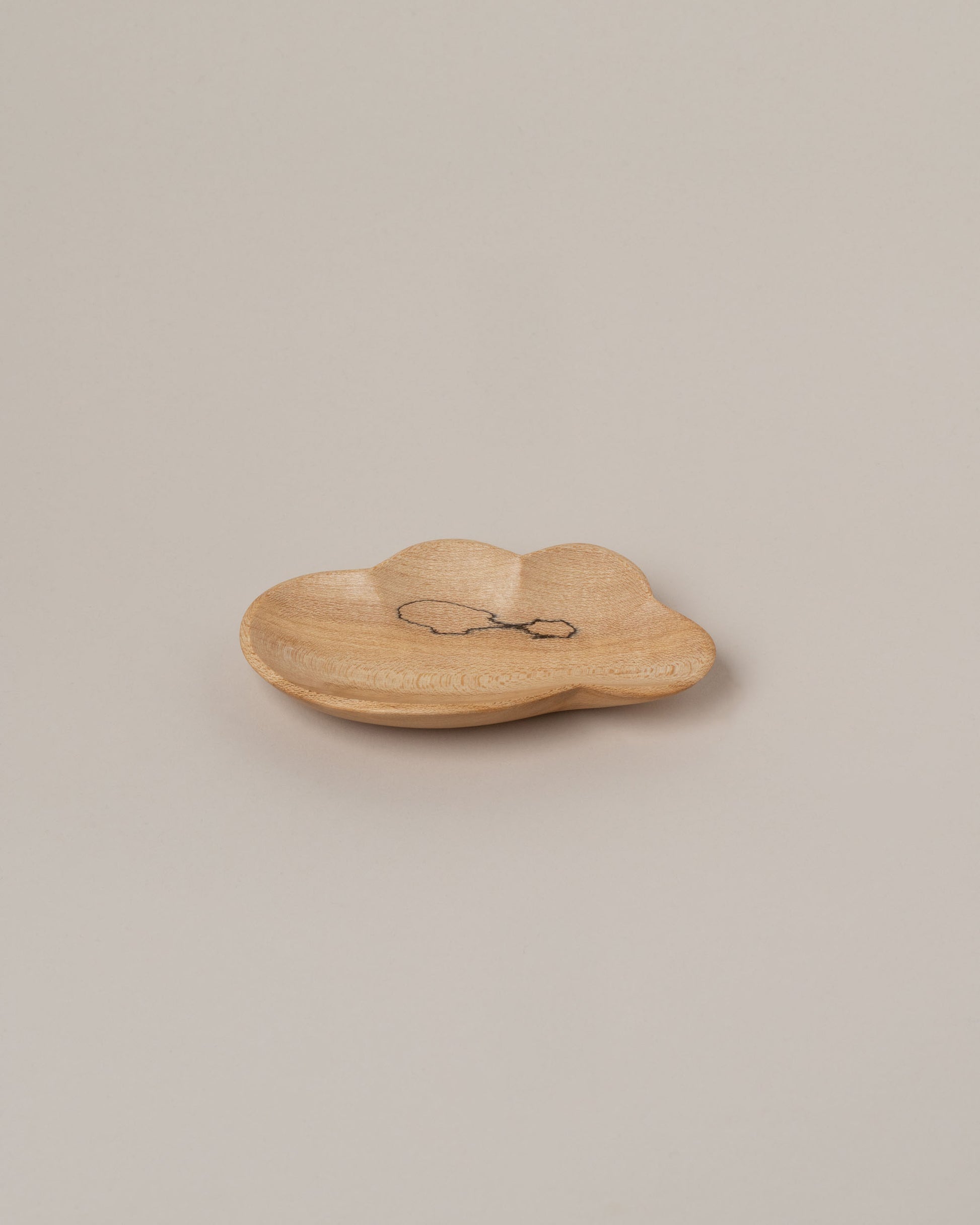Namu Home Goods Eight Cloud Plate on light color background.