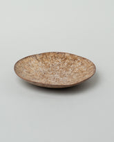 Namu Home Goods Caramel Mini Maple Wood Whittled Plate on light color background.
