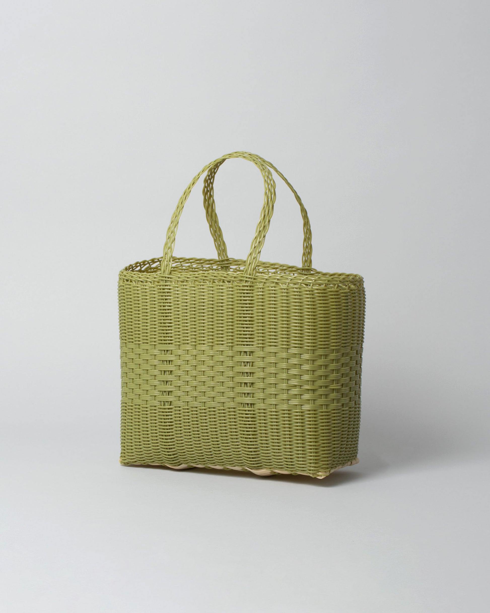 Palorosa Small Pistachio Lace Tote Basket Bag on light color background.
