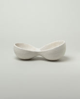 Nur Ceramics White Nabra Double Bowl on light color background.