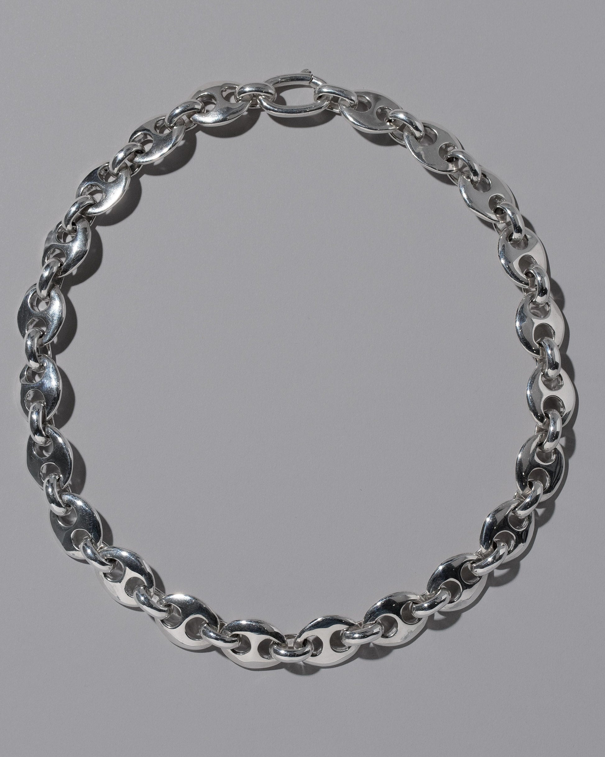 CRZM Sterling Silver Bedrock Bracelet on light color background.