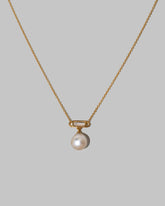 Closeup details of the Poseidon Necklace on light color background.