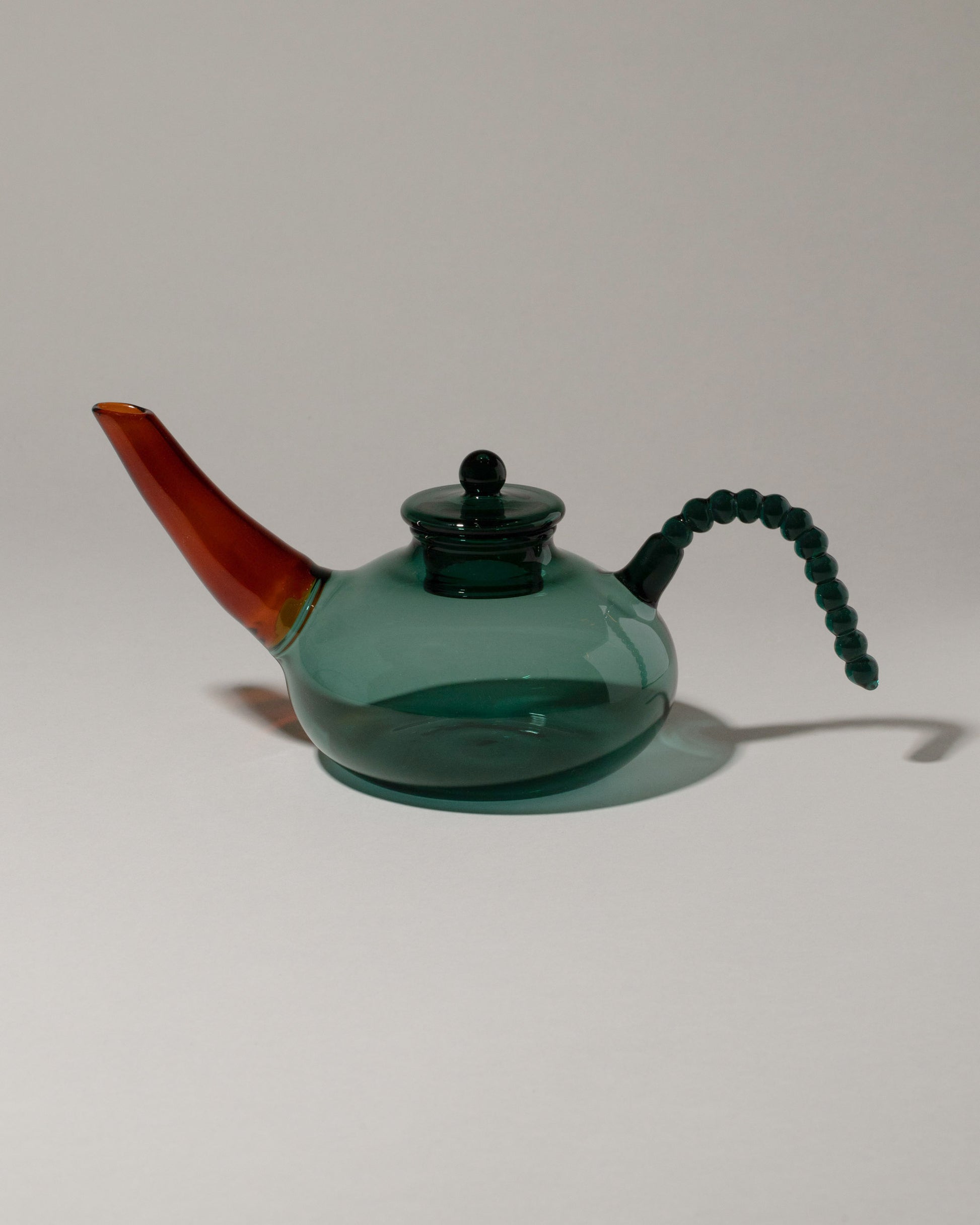 Ornamental by Lameice Amber & Teal Dreamlike Teapot on light color background.