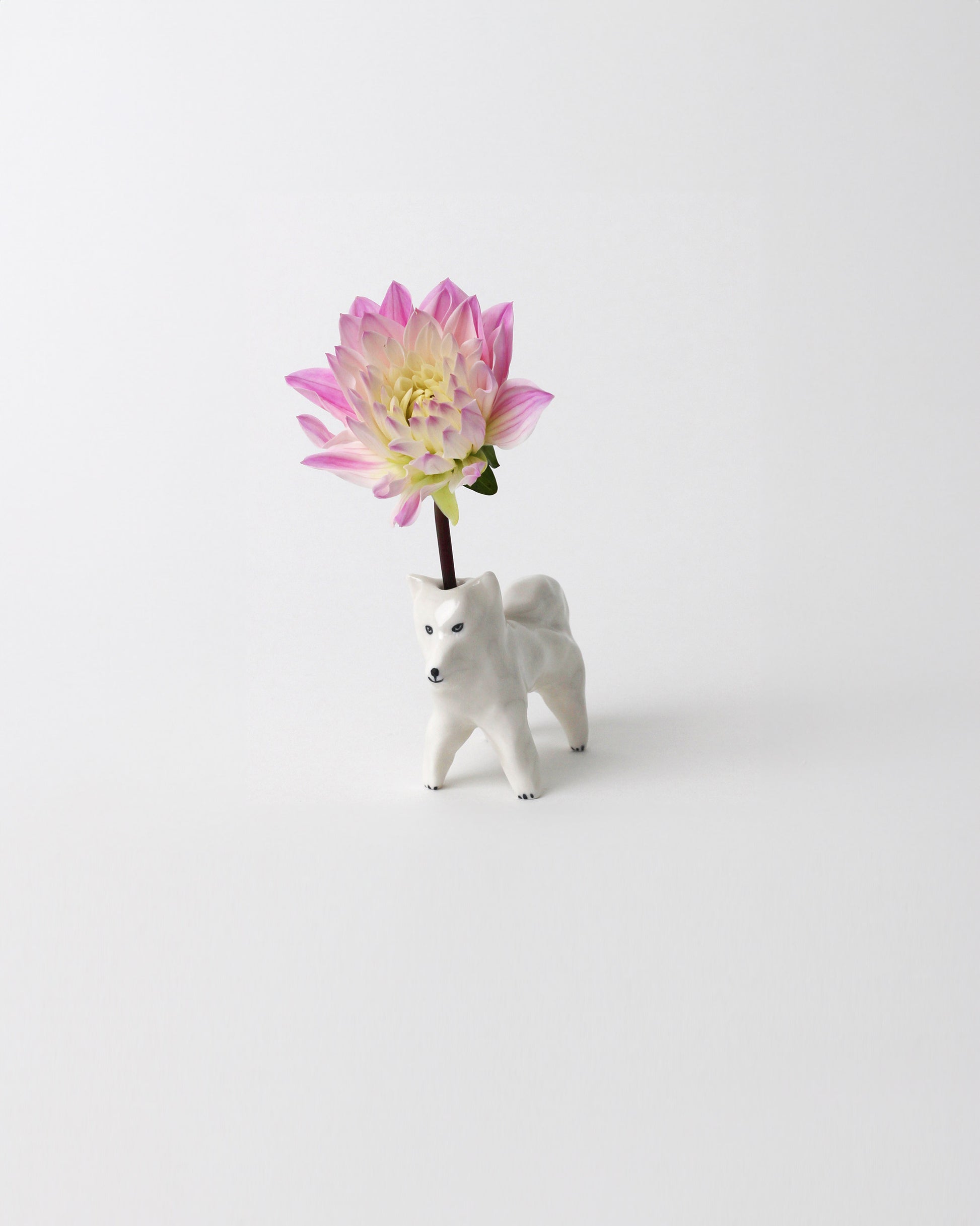 Eleonor Boström Samoyed PARK Dog Vase on light color background. Flower not included.