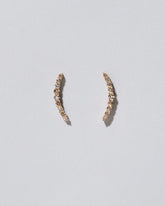 Crescent Ear Climber Stud Earrings - Champagne Diamond on light color background.