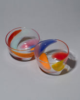 Group photo of Bow Glassworks Tutti Frutti Bowls on light color background.