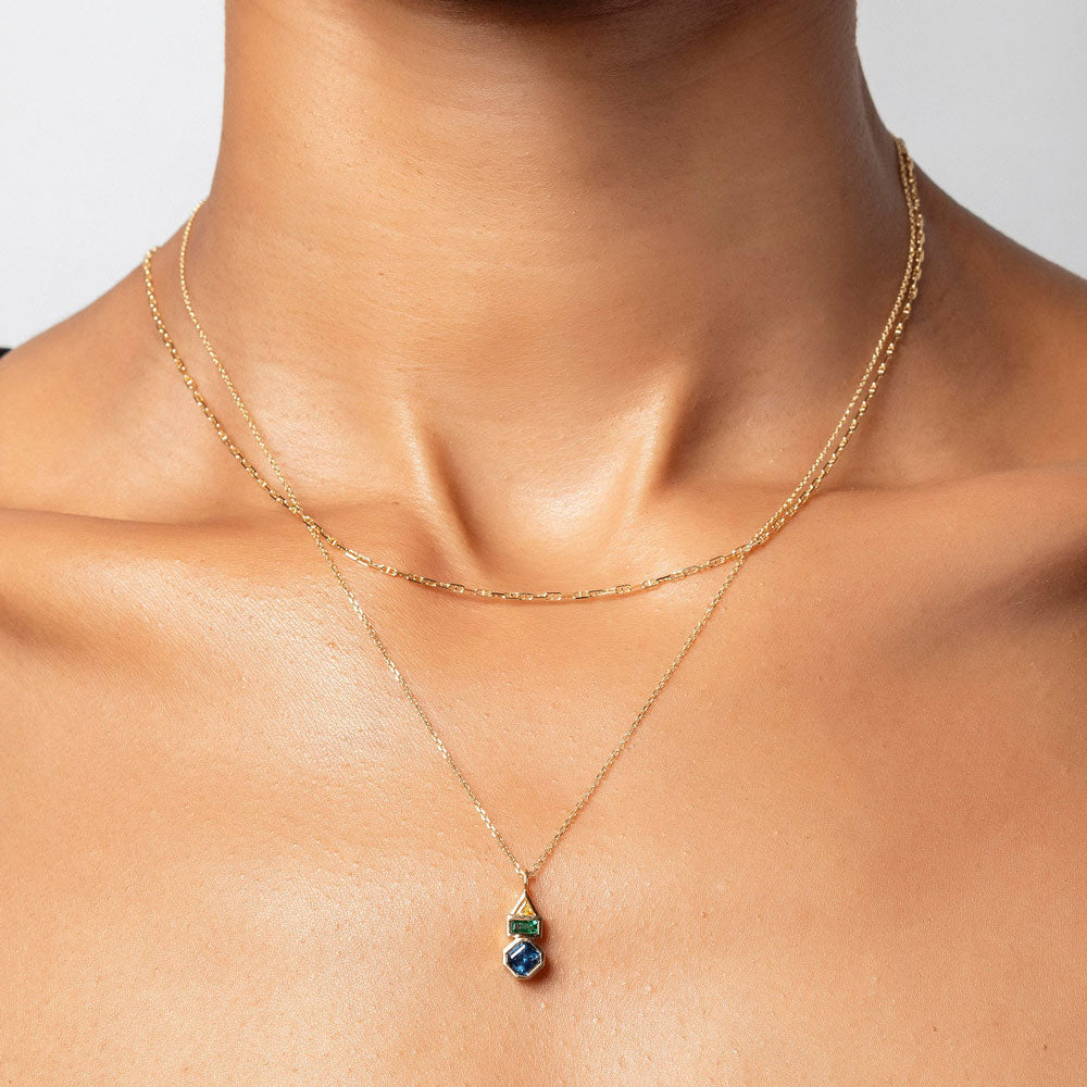 product_details::Positive Energy Necklace and Petite Diamond Cut Chain Necklace on model.