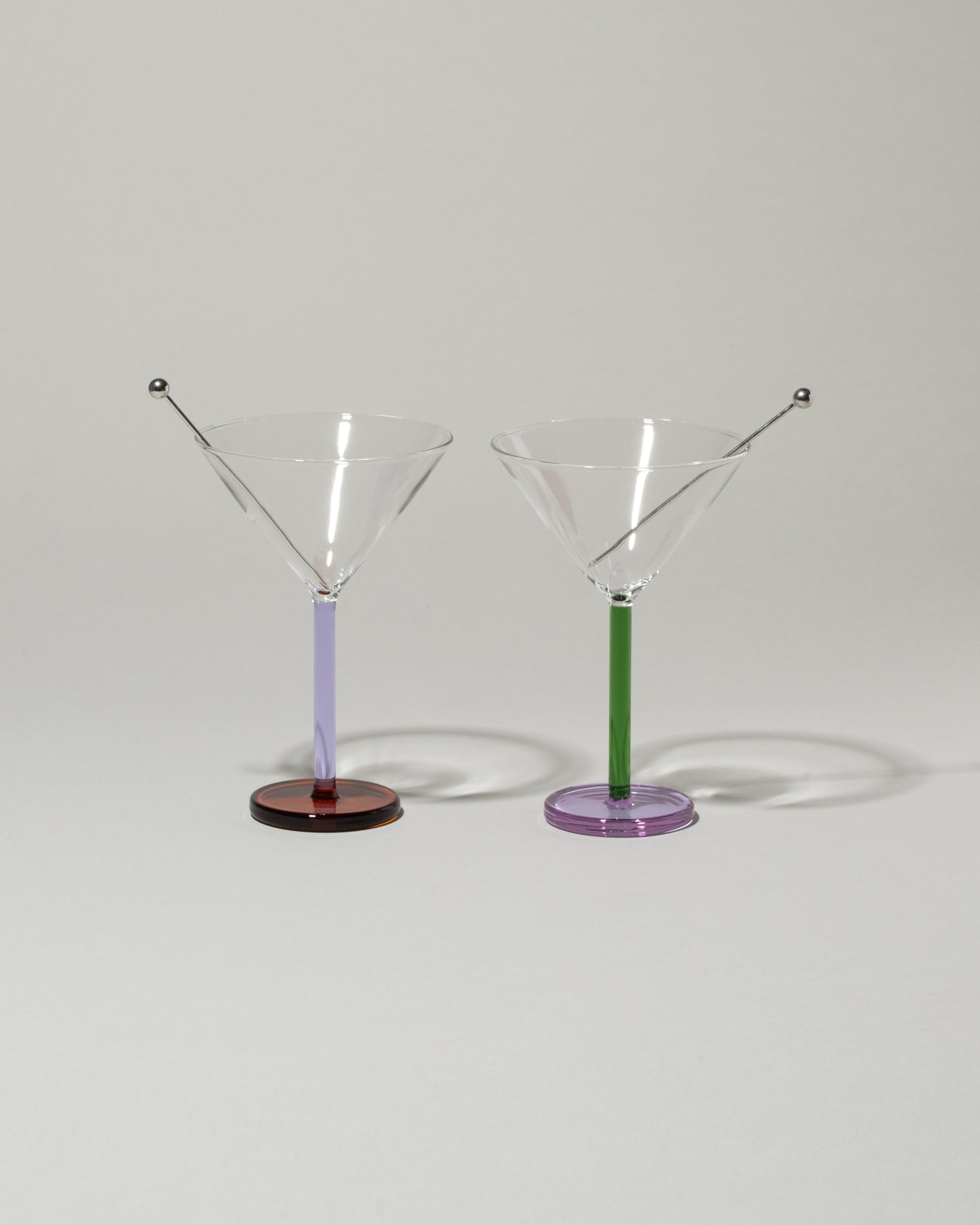 Sophie Lou Jacobsen Birdland: Lilac & Amber + Evergreen & Lilac Piano Cocktail Glass Set on light color background.