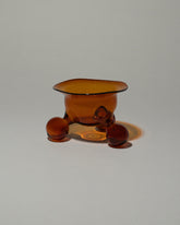 Ornamental by Lameice Amber Transparent Dreamlike Honey Bowl on light color background.