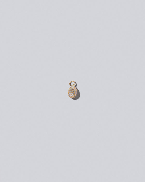Pavé Blue Egg Charm on light colored background