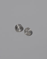 CRZM Sterling Silver Serpentinite Stud Earrings on light color background.