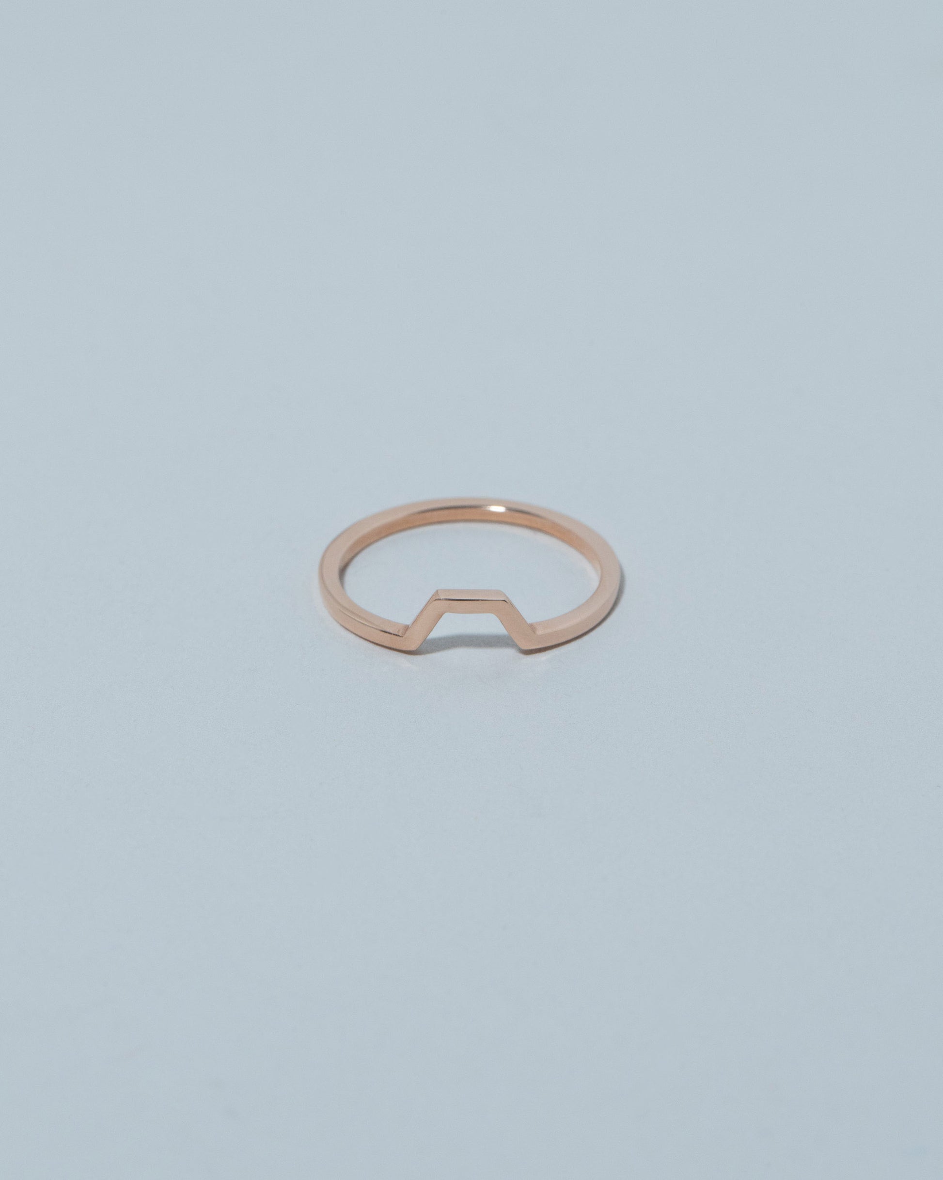 14k Rose Gold Bridge Band on light color background.