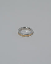 Samples & Imperfects 4mm Yellow Gold & Platinum Inlaid Band on light color background.