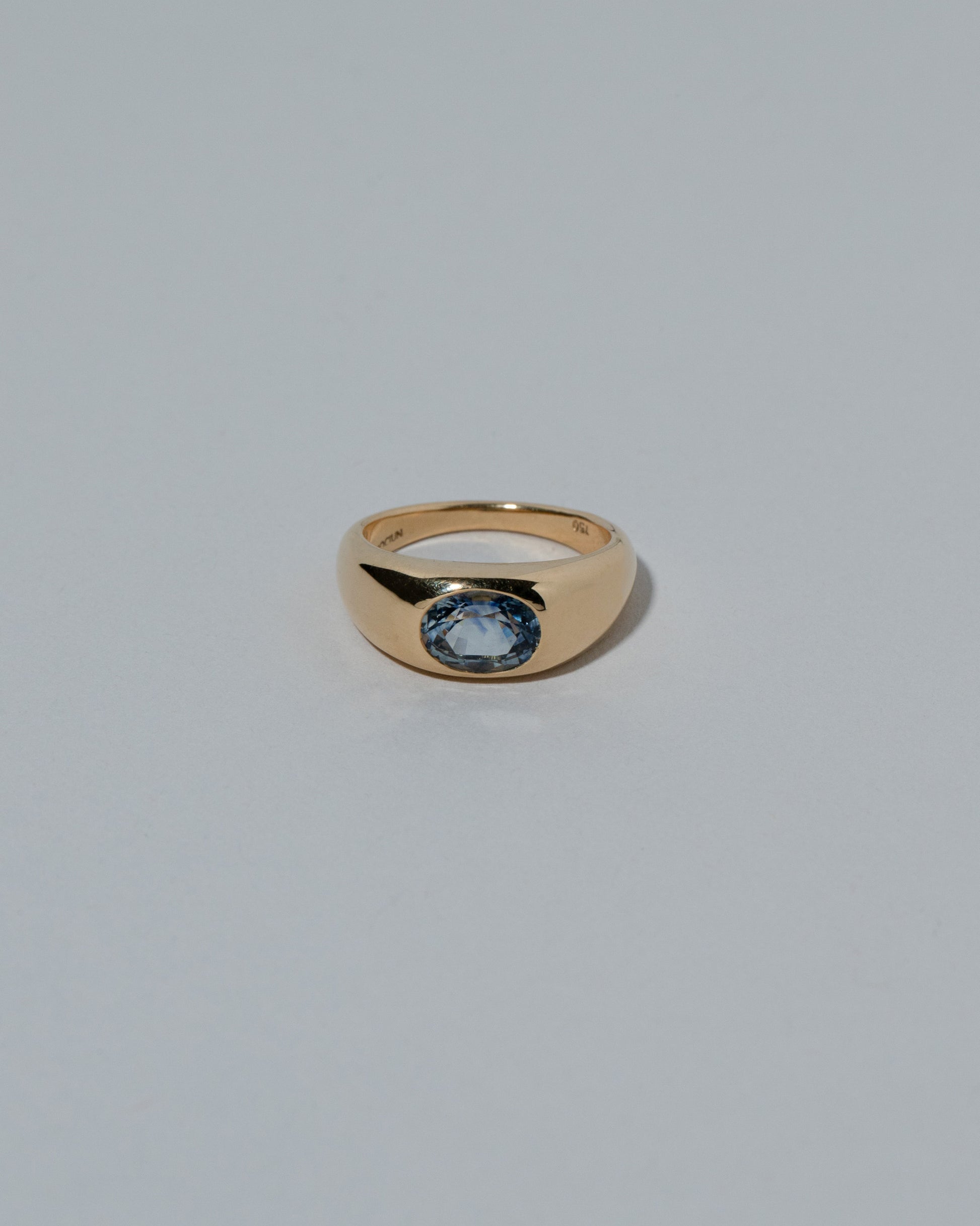 Samples & Imperfects Bicolor Blue Sapphire Jupiter Ring on light color background.