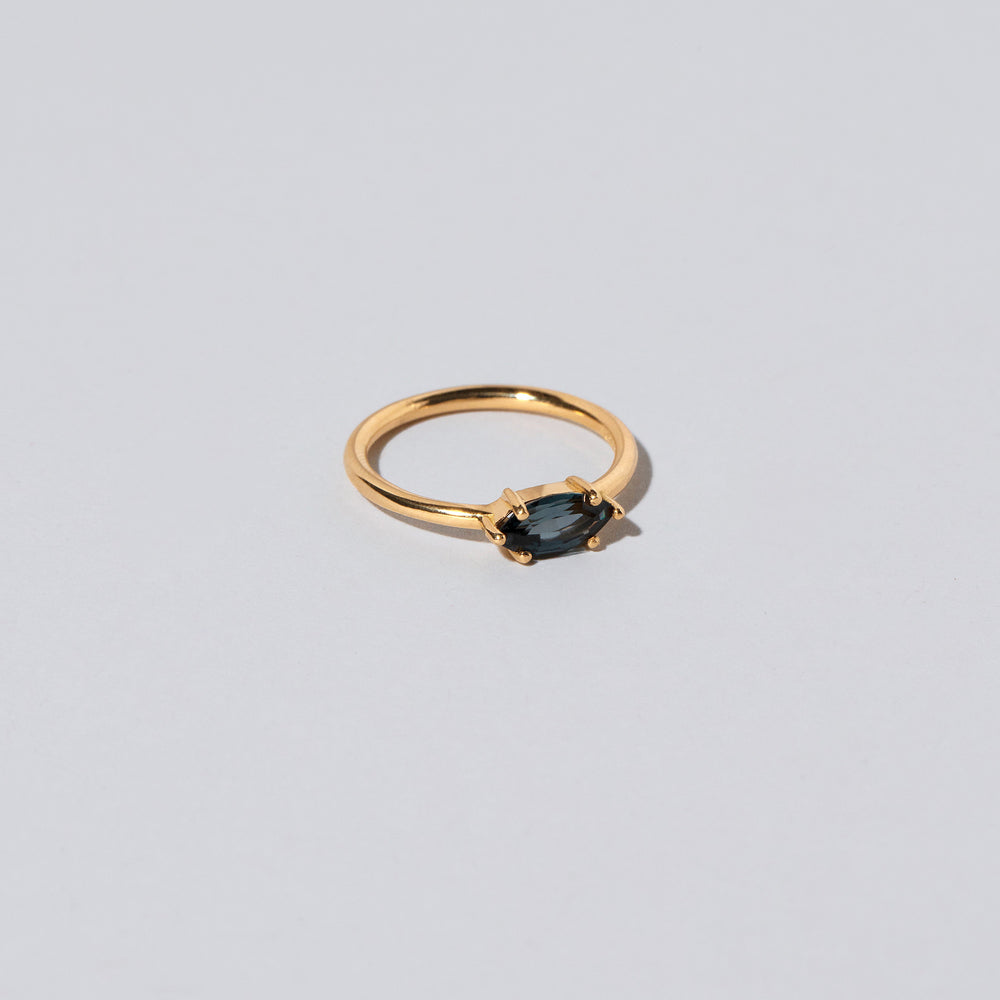 product_details::Deep Blue Ouvert Ring on light color background.