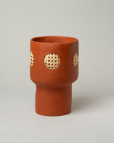 Stephanie Phillips Terracotta Rattan Vessel on light color background.