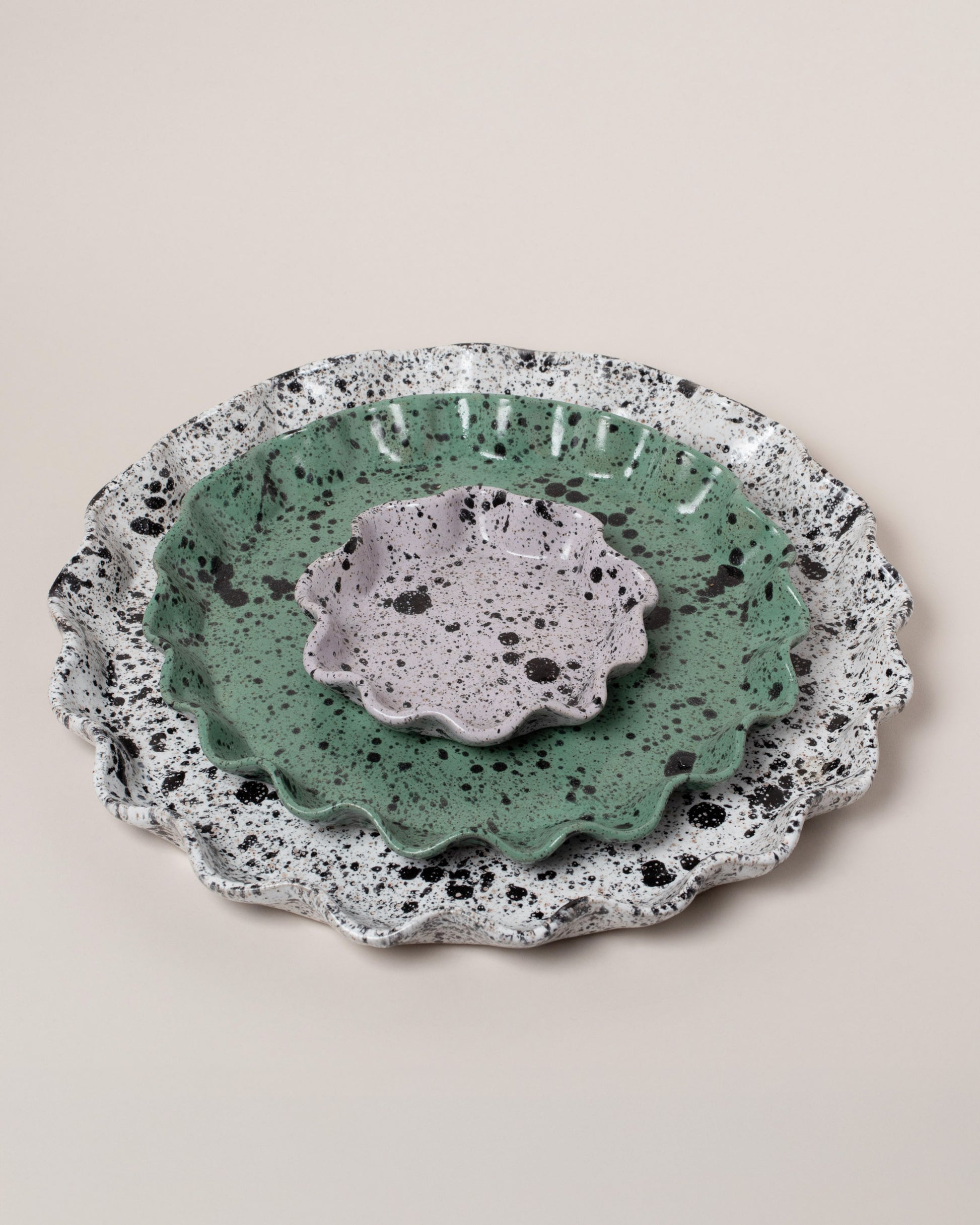 Closeup details of the Recreation Center Ruffle Platter Set on light color background.