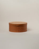 Rikke Falkow 11" Cherry Wood Oval Box on light color background.