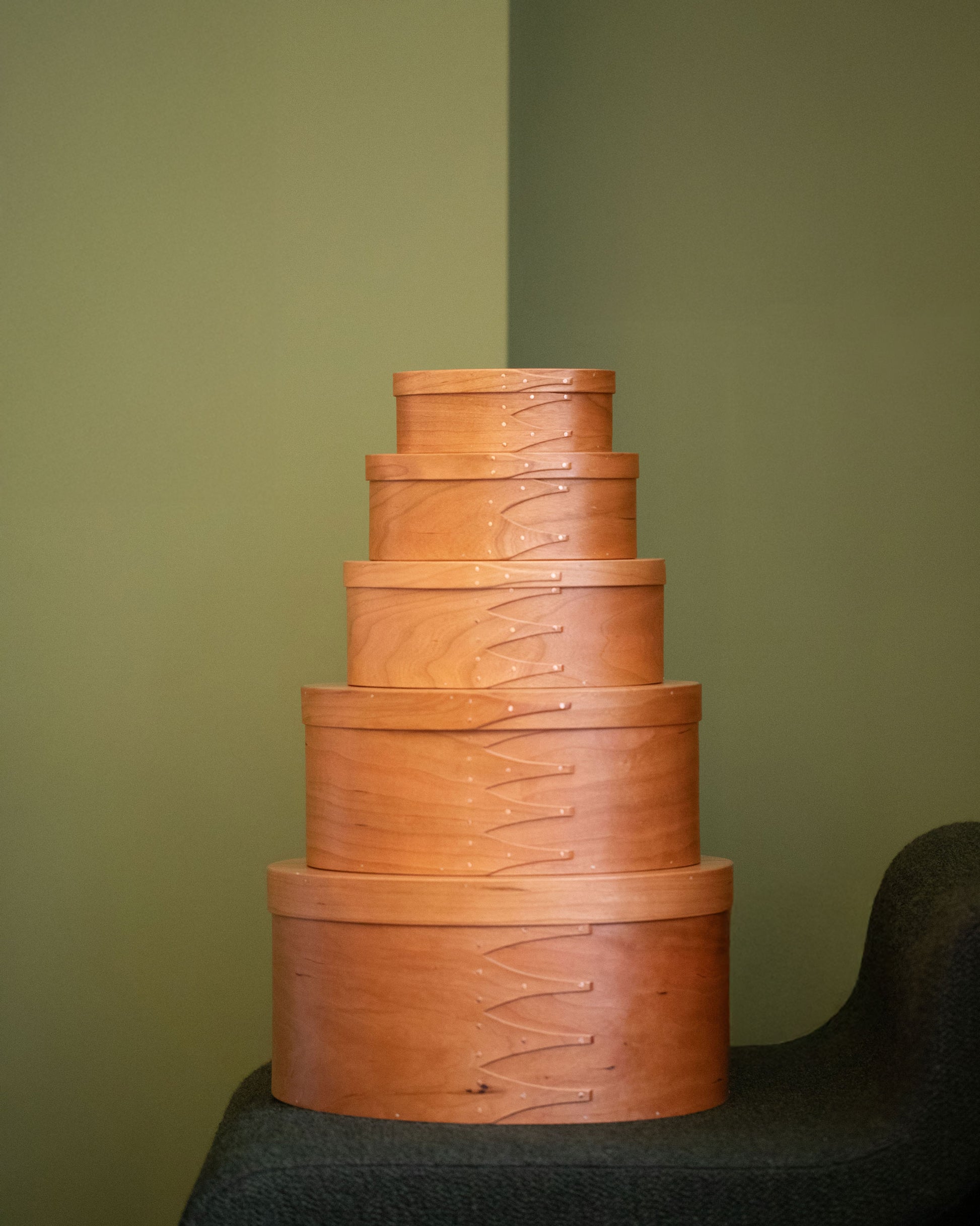 Styled image featuring the Rikke Falkow 13" Cherry Wood Oval Box.