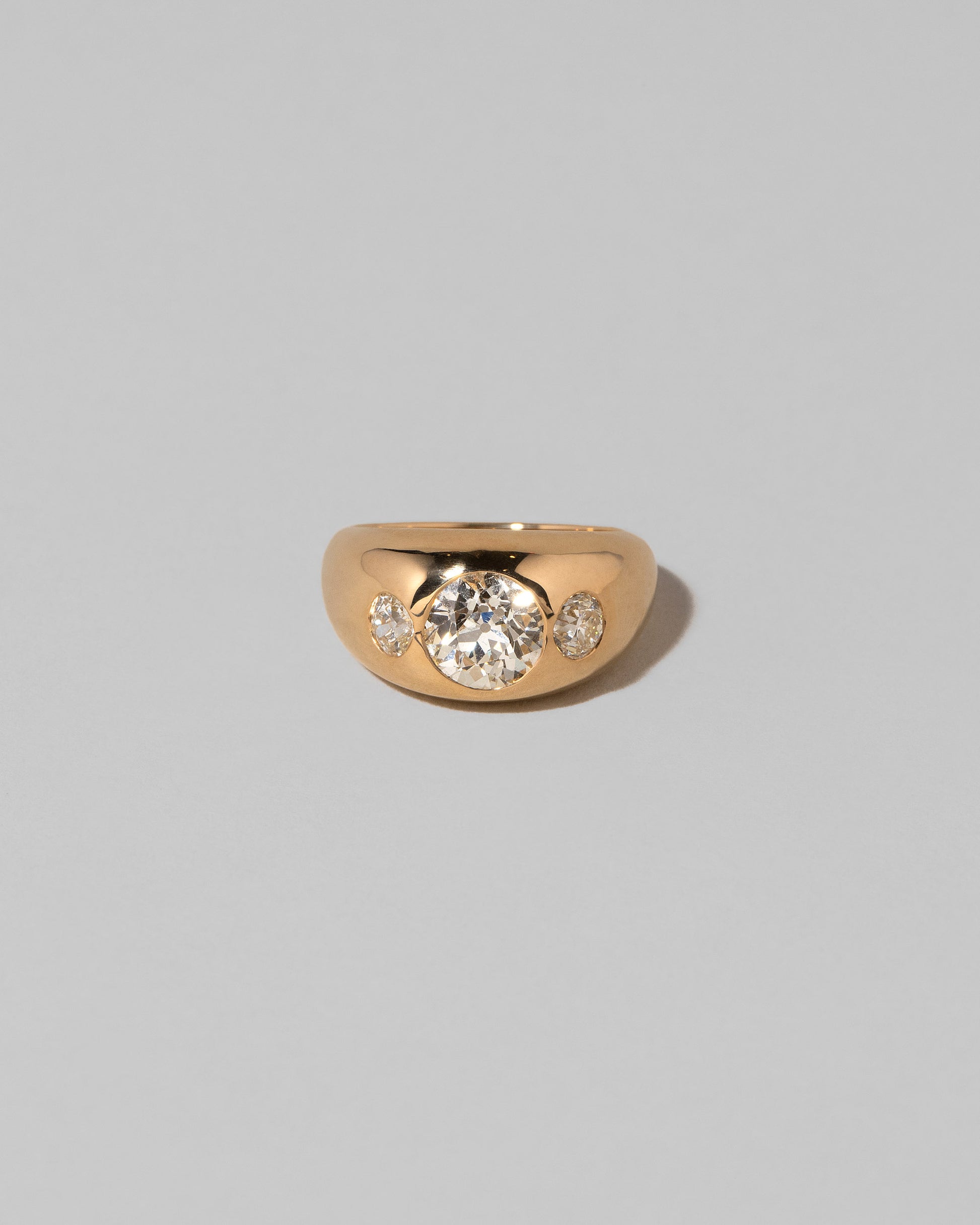 Diamond Saturn Ring on light color background.