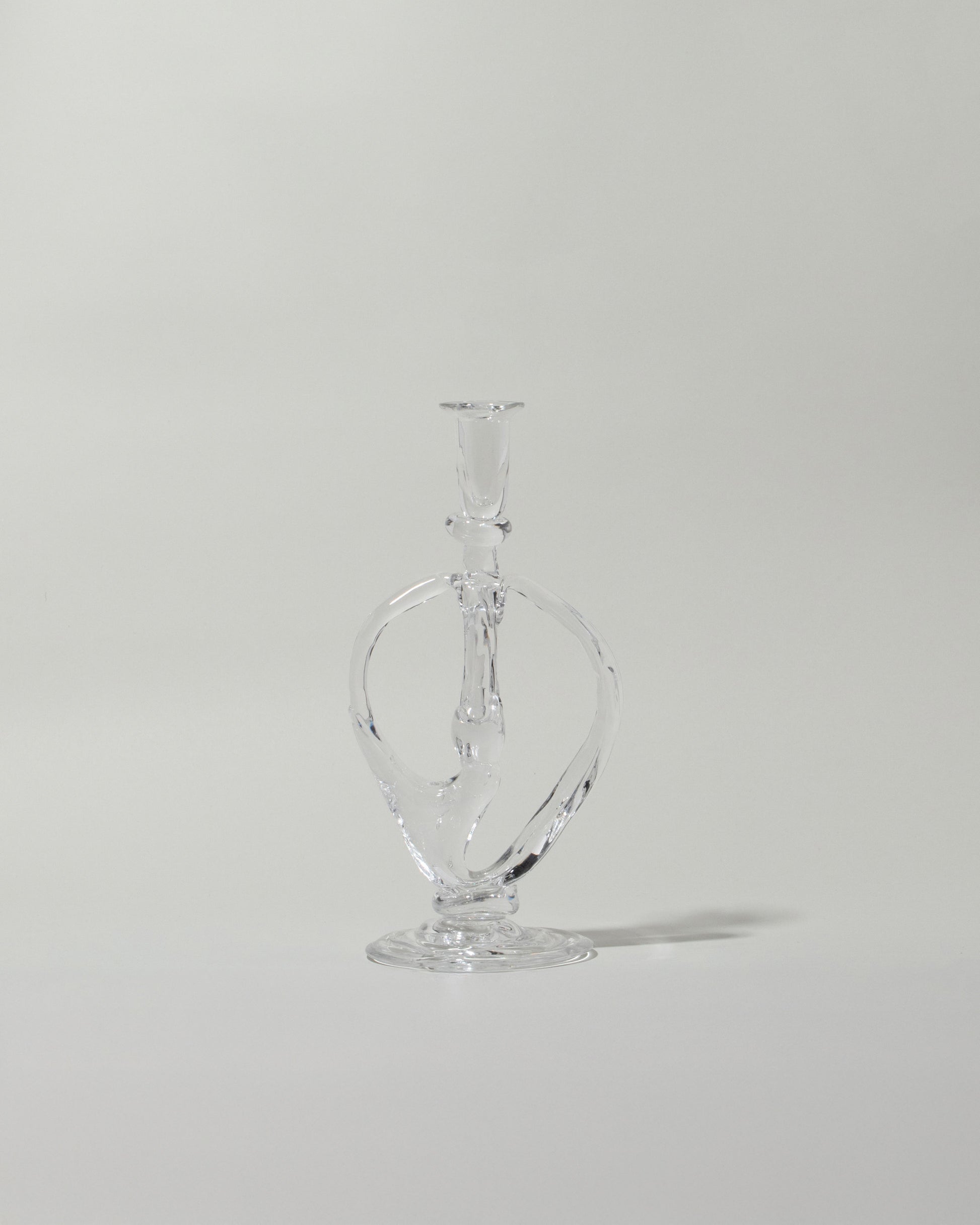 Silje Lindrup Four Glass Candle Holder on light color background.