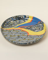 Closeup details of the Slush Club Nerikomi Platter No. 241 on light color background.