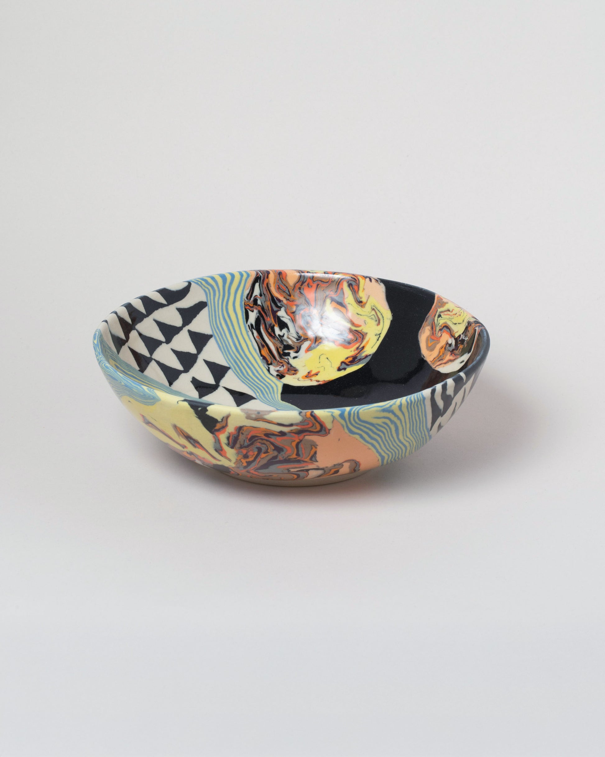 Slush Club Medium Nerikomi Bowl No. 101 on light color background.