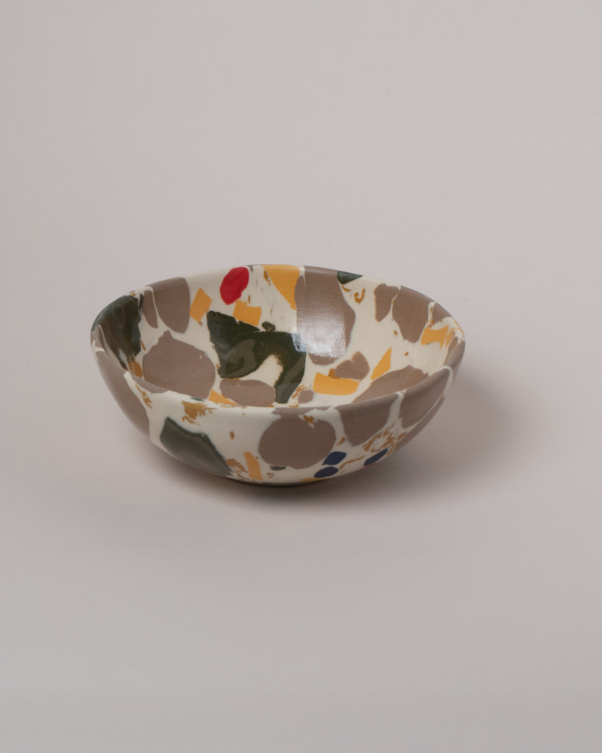 Slush Club Small Nerikomi Bowl No. 102 on light color background.