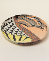 Closeup details of the Slush Club Nerikomi Platter No. 220 on light color background.