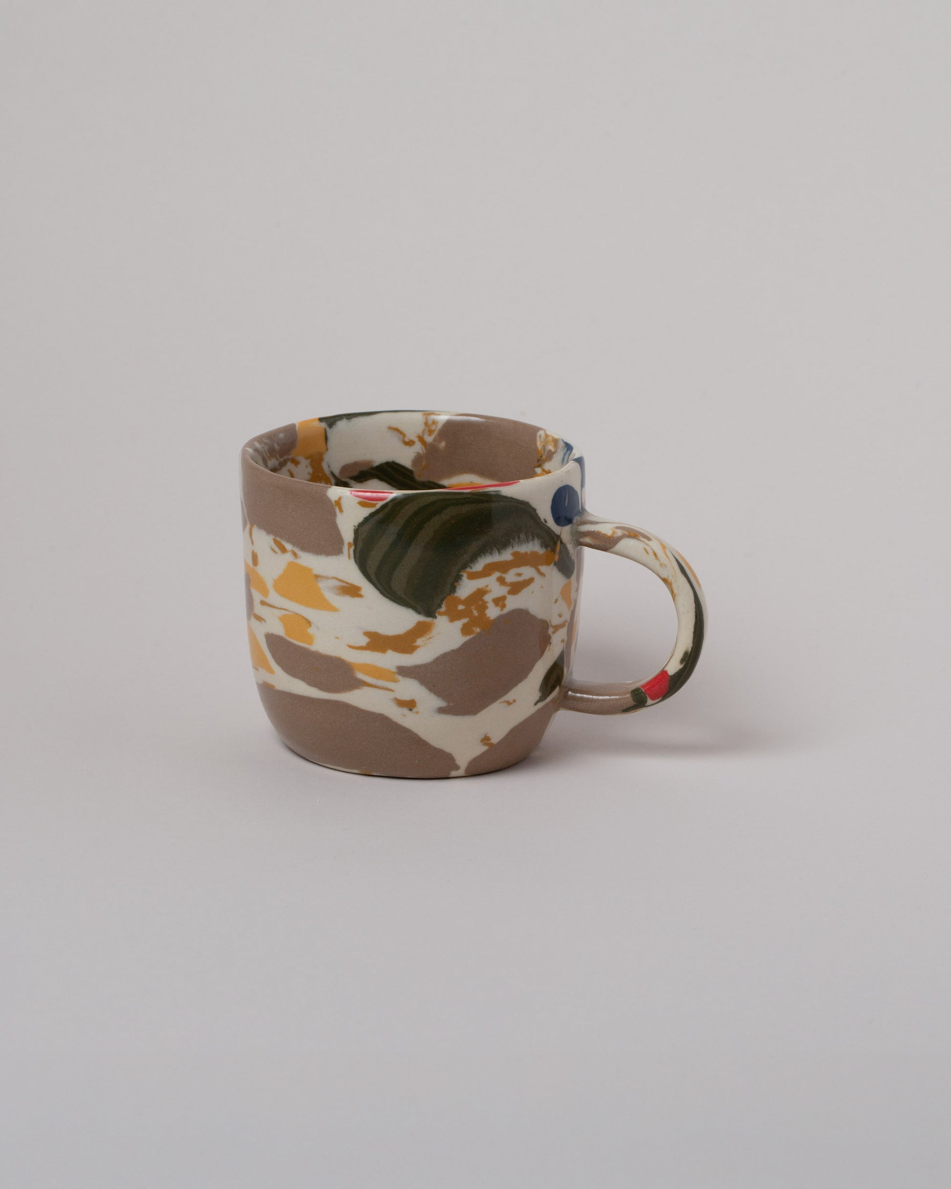 Slush Club Nerikomi Mug No. 102 on light color background.