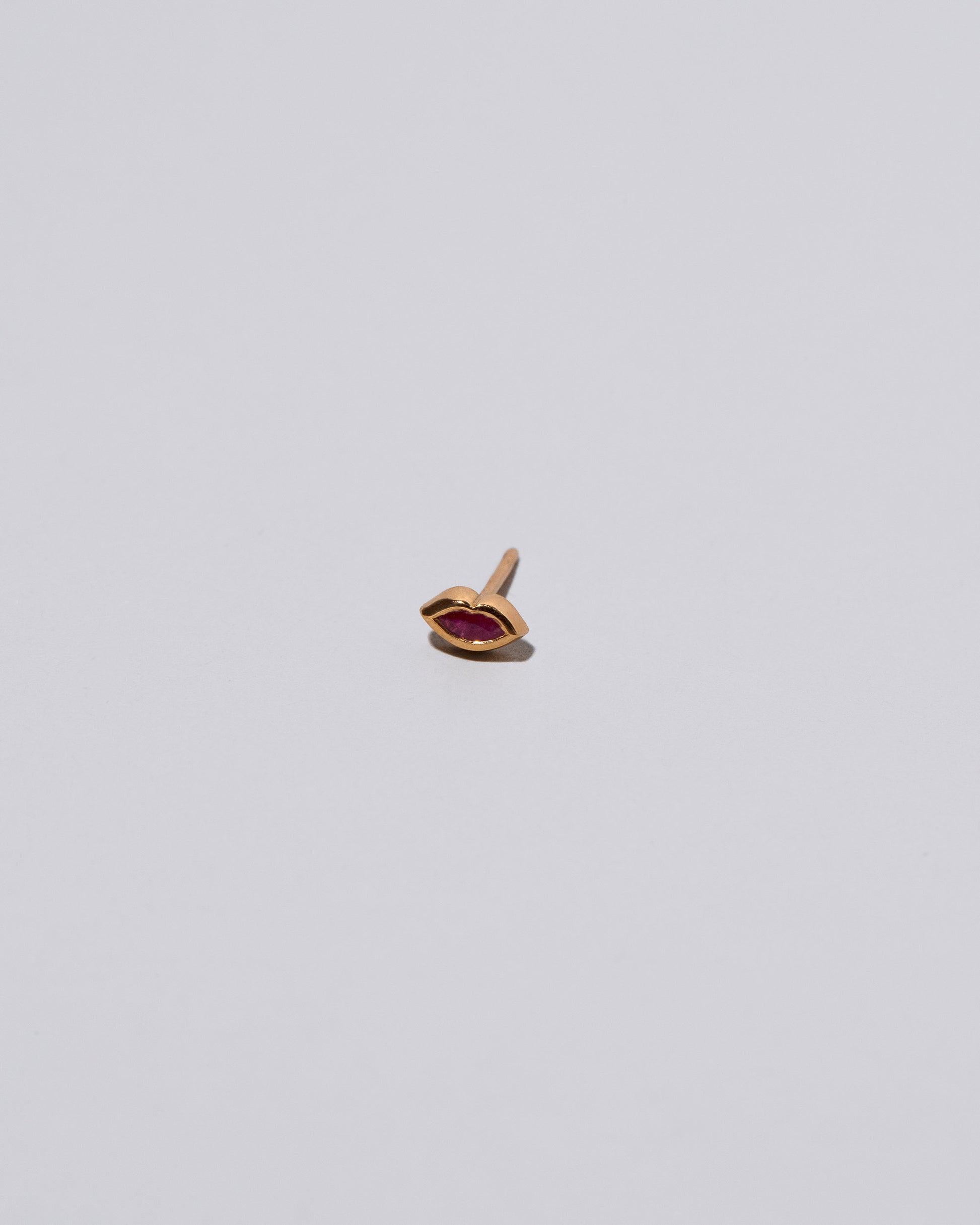 Magenta Sweet Little Kiss Stud Earring Single on light color background.