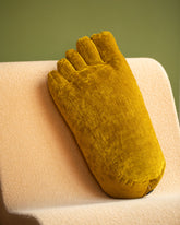 Styled image featuring the Sohn Chartreuse Chenille Soft Sculpture Foot Pillow.