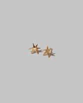 Shape One Small Verve Six Point Star Stud Earrings on light color background.