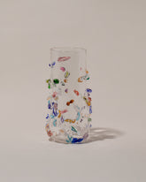 Stover Glass Tall Cane Vase on light color background.