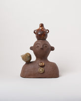 Studio Mano/Bruno Nakano Apotropaia Bust with a Vase Face and a Bird on light color background.